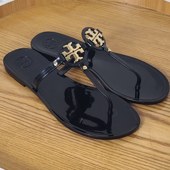 black jelly flip flops